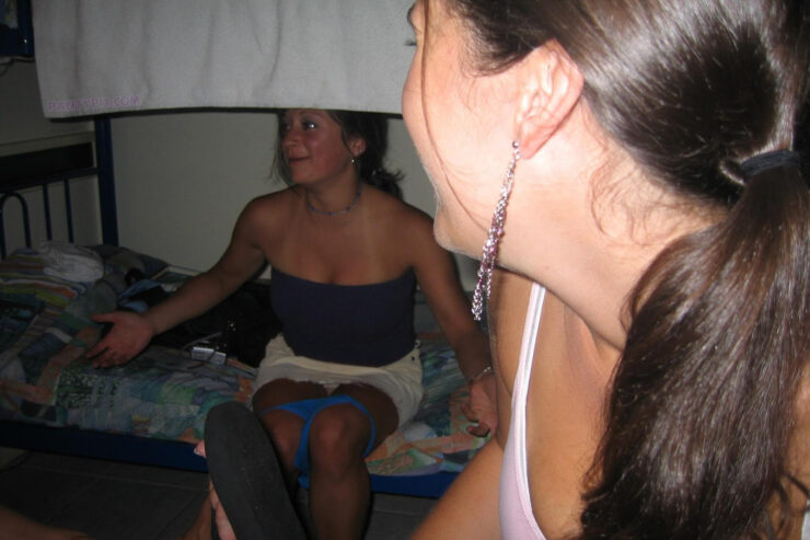 Candid shot of her friend changing undies at a party