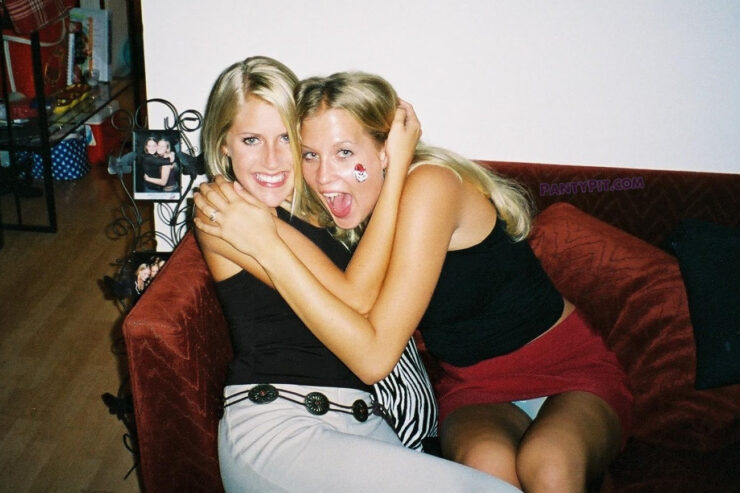 Beautiful drunk blondes hugging each other and an upskirt shot of her panties